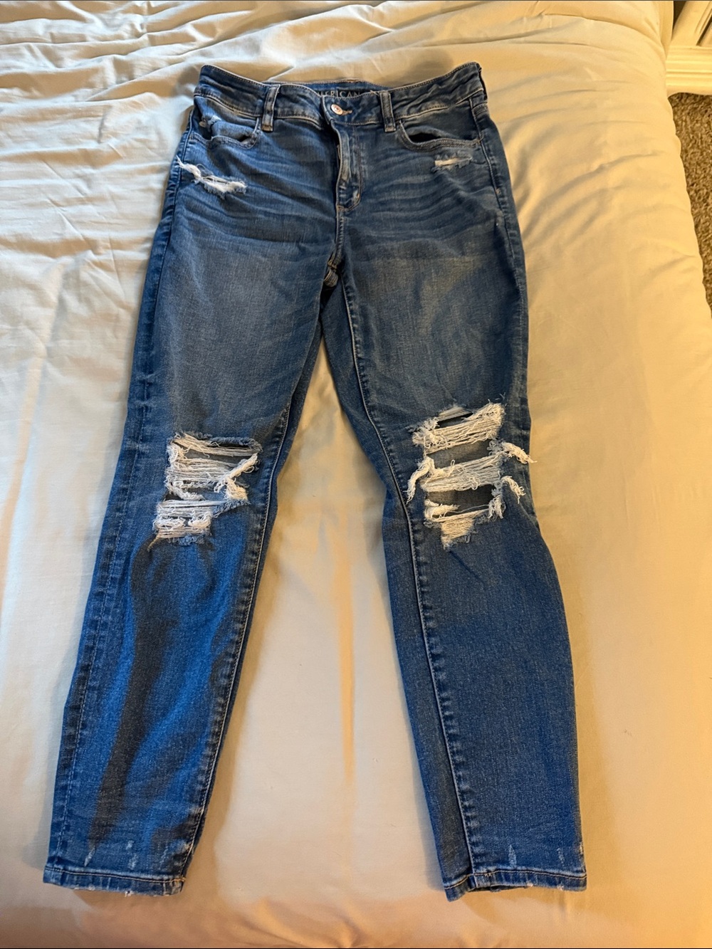 Distressed Women's Blue Jeans - Classic Ripped Denim